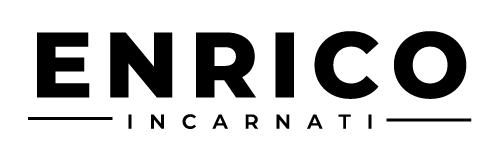 Black text on white background reads "ENRICO" with "INICARNATI" below, flanked by horizontal lines.
